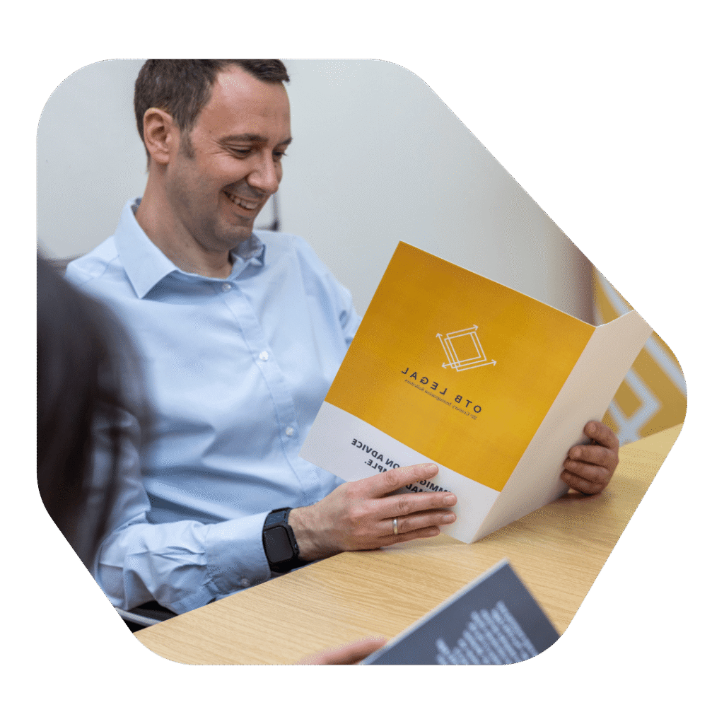 Solicitor reading a leaflet about how to start sponsor licence application