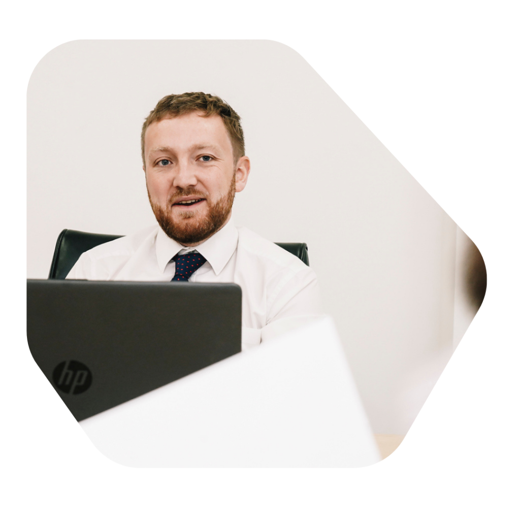 British Citizenship Solicitors Man at desk on laptop