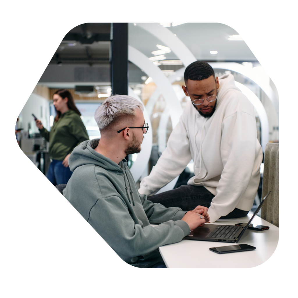 2 men discussing business for the Innovator Founder Visa UK Application