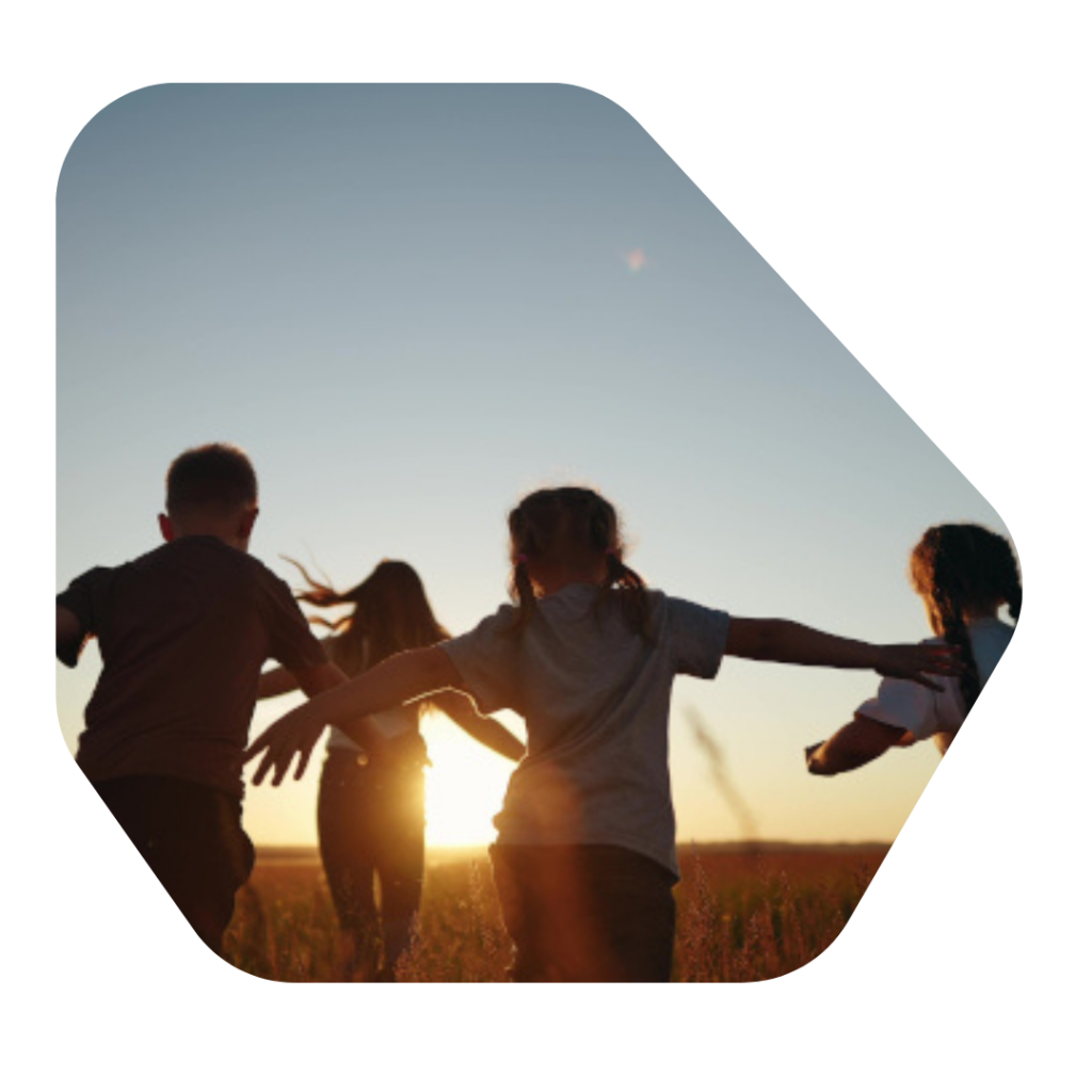 Children running in a field. Parent of a Child Visa UK requirements
