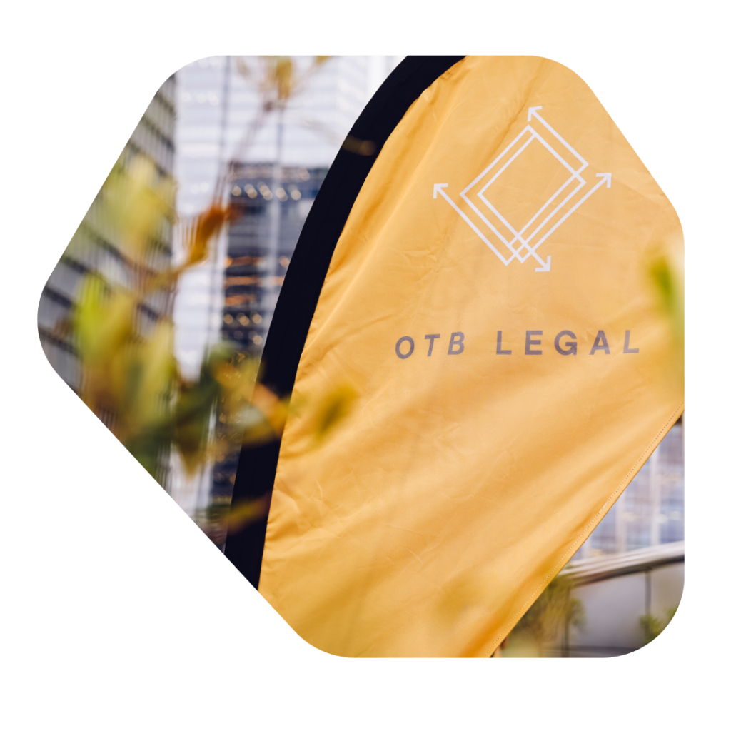 OTB Legal Immigration Solicitors Flag outdoors. Specialist Adult Dependent Relatives Visa UK Solicitors